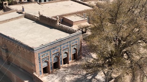 Punjab , Pakistan - 06 23 2022: Aerial View Of Jalaluddin Bukhari Tomb and Mosque At Uch Sharif In Pakistan. Circle Dolly