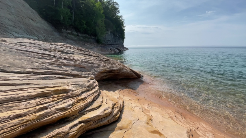 Pictured Rocks Lakeshore Rock Formations On Lake Superior With Trees Sunny Day Michigan Summer