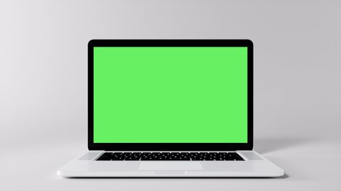 Green Screen Display Laptop Opens and Zoom In on a White Background. Empty Green Mock-up Monitor for Video Call, Website Template Presentation or Game Applications. Blank Screen Monitor 3D render Video de stock