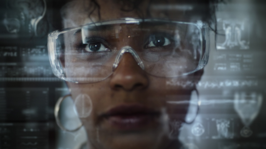 
Close-Up Shot of African American Female Doctor or Scientist With Augmented Reality or Virtual Reality Headset. Holographic Animation Futuristic Medical Charts. MRI, Brain, DNA And Science Animations Royalty-Free Stock Footage #1091776919