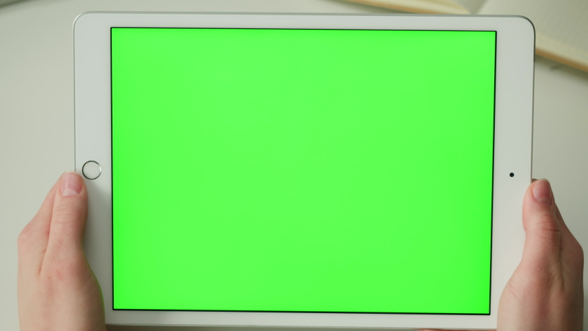 Gadget tablet with green chroma key screen close-up. Doctor workplace, woman nurse working. Distance education, e-learning. | Shutterstock HD Video #1091788371