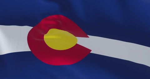 Close-up view of the Colorado flag waving. Colorado is a United States state located in the Rocky Mountains Region. Seamless loop in slow motion