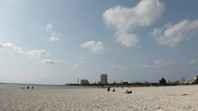CHTAN-CHO, OKINAWA, JAPAN - AUGUST 2021 : View of Araha beach (Ocean or sea) in daytime. Summer holiday, vacation and resort concept video.
