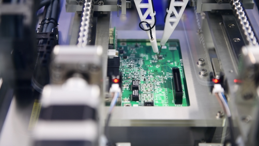 Automated technology of Assembly of computer circuit board Electronic circuit board production in machinery and technology | Shutterstock HD Video #1091800671