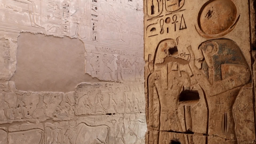 Drawings on the walls of the Medinet Habu Temple in Luxor, Egypt