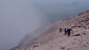 A group of climbers ascending a mountain 