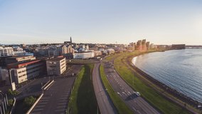 Establishing Aerial View Shot of Reykjavík, Iceland, Reykjavik, golden light, waterfront