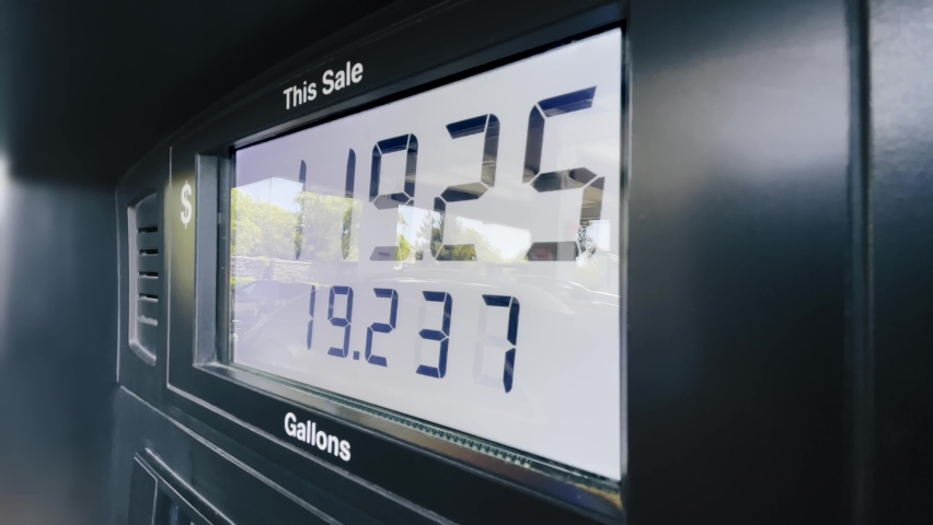 The highest maximum fuel price increase due to inflation in California USA. Static shot of gasoline price counter on display showing gas price on digital display, gas pump meter running at gas station