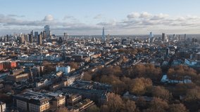 Establishing Aerial View Shot of London UK, Beautiful skyline, sunny day with clouds, United Kingdom