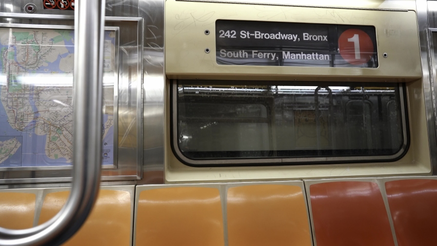 Inside one Subway train in NYC. Riding Subway to South Ferry in Manhattan