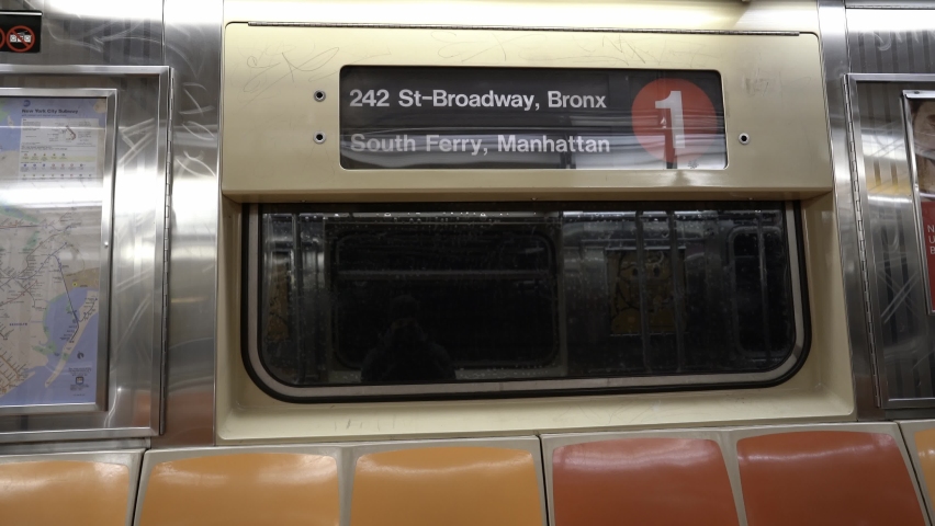 Inside one Subway train in NYC. Riding Subway to South Ferry in Manhattan