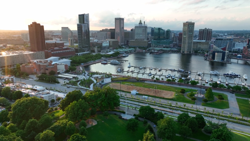 Federal Hill neighborhood and Inner Harbor Baltimore Maryland. Aerial establishing shot.