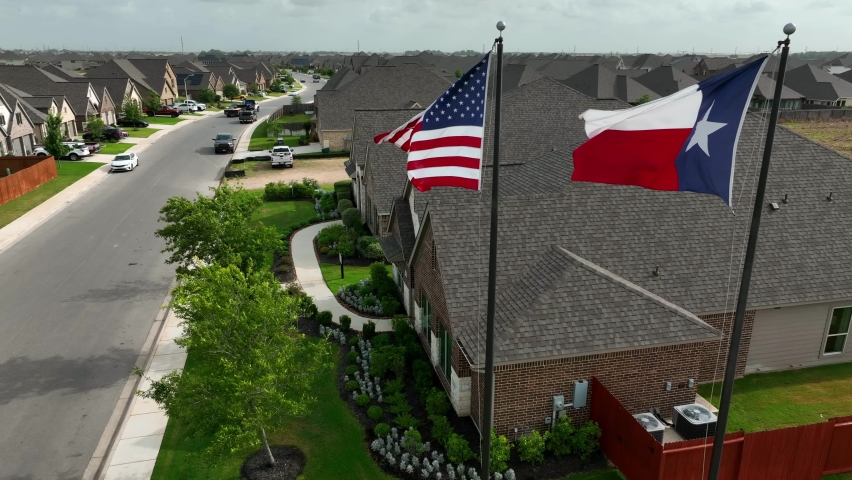 Housing in Texas. New residential neighborhood community with single family houses. Homes in large development. Population growth in Southern USA theme. Rising aerial reveal. Royalty-Free Stock Footage #1091857431