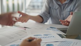 Great resignation fatigue talent workforce crisis toxic workplace issue. Bored sad annoy team asia two people bad anger yell tired sit at office table talk rude to staff worker in wrong project refuse - Powered by Shutterstock - Get 15% off with code: PIKWIZARD15