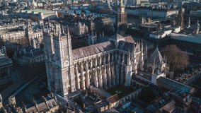Westminster Abbey, Establishing Aerial View Shot of London UK, United Kingdom, day, clow circling