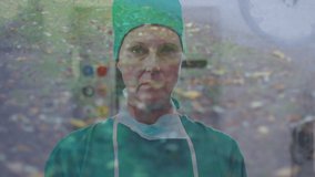 Animation of blurred park over caucasian female surgeon putting on face mask. Health, medicine and city life concept digitally generated video.