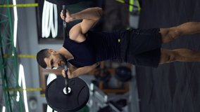 Muscular man training with barbell, doing squats in gym - Powered by Shutterstock - Get 15% off with code: PIKWIZARD15