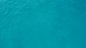 Turquoise blue sea abstract 4k video. Aerial view of the seascape of the Mediterranean sea, Costa Brava, Catalonia, Spain. Conceptual background of summer beach vacations tourism. Paradise.