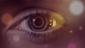 Glowing spots of light against round scanner over close up of female eye. Biometric scanning and technology concept - Powered by Shutterstock - Get 15% off with code: PIKWIZARD15