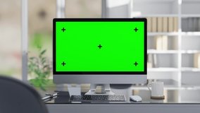 Computer MockUp on work desk in office Designed in minimal. Selective focus on  screen. can be used in education and business. Green screen for banner and logo. Animation, 3D Render. - Powered by Shutterstock - Get 15% off with code: PIKWIZARD15