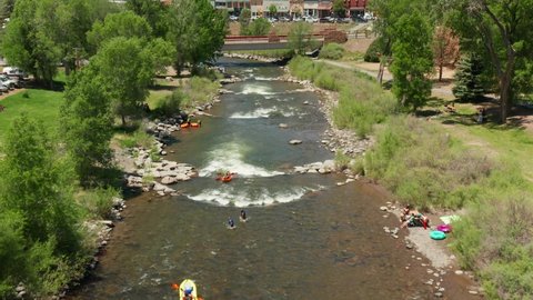 Pagosa Springs , CO , United States - 06 26 2022: People enjoying the San Juan River, in Pagosa Springs, Co