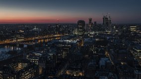 Establishing Aerial View Shot of London UK, United Kingdom at night evening, Battersea, Vauxhall