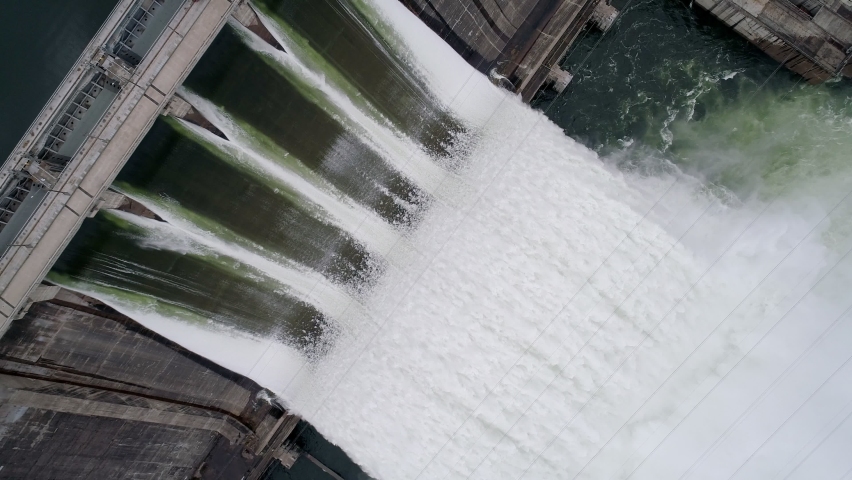 Aerial top down view of water discharge at hydroelectric power plant of Krasnoyarsk city, Siberia, Russia Royalty-Free Stock Footage #1091899113