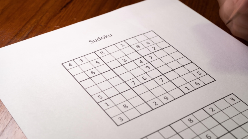 Solving Sudoku puzzle in time-lapse Royalty-Free Stock Footage #1091902623