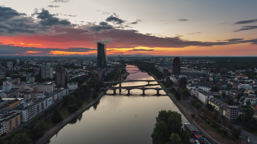 Red on the sky, morning, river, Establishing Aerial View Shot of Frankfurt am Main De, financial capital of Europe, Hesse, Germany 