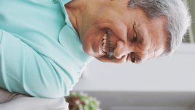Video of happy biracial senior couple using tablet in garden. active retirement lifestyle, senior relationship and spending time with technology concept. - Powered by Shutterstock - Get 15% off with code: PIKWIZARD15