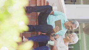 Video of happy biracial senior couple using tablet in garden. active retirement lifestyle, senior relationship and spending time with technology concept. - Powered by Shutterstock - Get 15% off with code: PIKWIZARD15