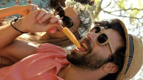 Group of hipster friends enjoying and eating ice cream at a music festival  - Powered by Shutterstock - Get 15% off with code: PIKWIZARD15