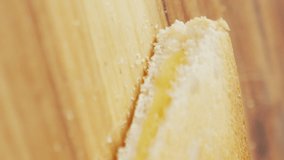 Video of slices of toasted cheese white bread sandwiches on wooden chopping board background. fusion food and fresh homemade snack concept. - Powered by Shutterstock - Get 15% off with code: PIKWIZARD15