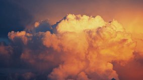 Cloud time lapse 4k. Sunset sky dramatic cumulus cloud motion time lapse. Orange red sunset sky puffy cloud scape timelpase. Fast cotton  cloud move run pass fly sky time lapse background 4K sun 