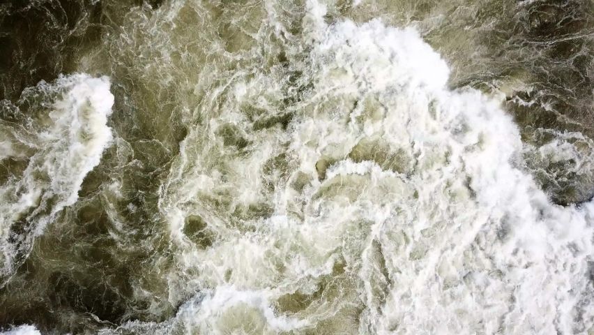 Water rapids on the Nile River in Uganda. Blue-green water - drone view from above