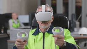 Industrial engineer testing augmented reality headset and joystick. Construction worker in office using vr goggles in office - Powered by Shutterstock - Get 15% off with code: PIKWIZARD15