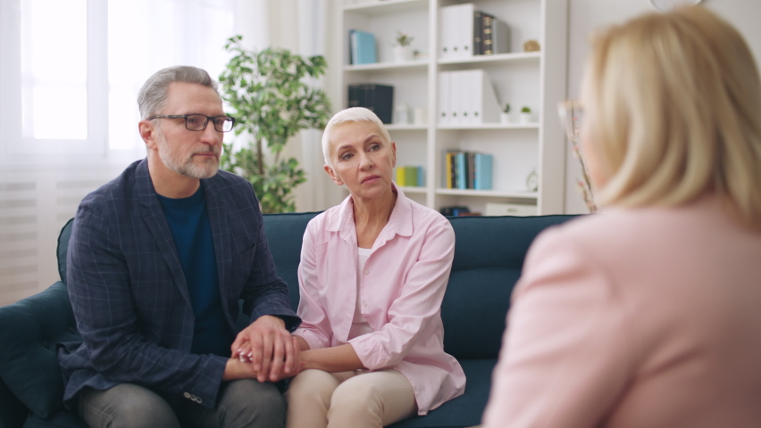 Couple in their 50s on therapy session with psychologist, marriage counselling Royalty-Free Stock Footage #1091953211