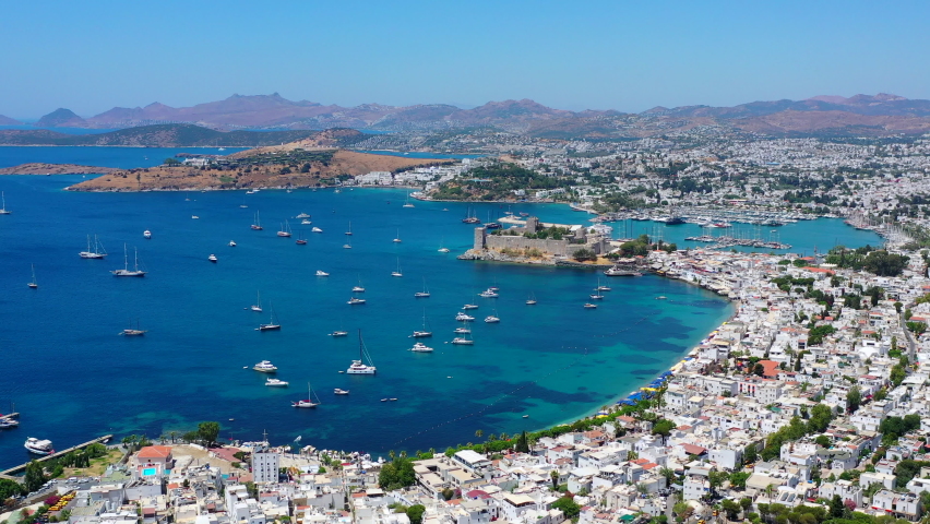 Aerial view of Bodrum. Bodrum is a city on the Bodrum Peninsula, stretching from Turkey's southwest coast into the Aegean Sea.	 Royalty-Free Stock Footage #1091973661
