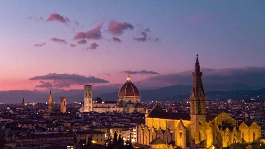 Establishing aerial view of Florence Cathedral, Firenze Cattedrale di Santa Maria del Fiore, Ponte Vecchio and Arno River on a beautiful colourful sunset sky, Tuscany region of Italy Florence Royalty-Free Stock Footage #1091979877