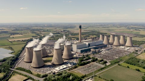 DRAX POWER STATION, UK - JUNE 20, 2022.  4K aerial footage of Drax coal fired power station in North Yorkshire, UK which has been converted to burn biofuel to reduce the plant’s carbon footprint