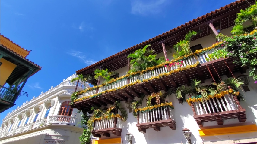 Famous colonial Cartagena Walled City, Cuidad Amurrallada, and its colorful buildings in historic city center, a designated UNESCO World Heritage Site. | Shutterstock HD Video #1091997441