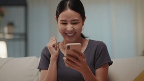 Asia people single woman sit at home sofa couch read and look at man boy photo post on phone. Relax smile choose lover enjoy play right swipe on tinder app to find love couple in fun match flirt chat. - Powered by Shutterstock - Get 15% off with code: PIKWIZARD15