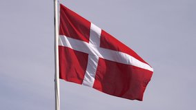 Denmark Flag Waving in the Wind Close Up with sky background. High quality 4k Static