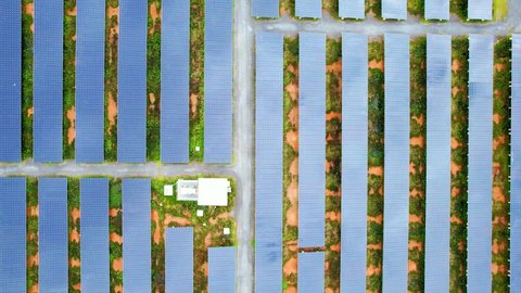 Drone fly over solar farm, renewable energy from solar. Clean energy production in Thailand. drone footage. 4k
