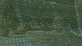 Animation of financial data and graphs over legs of male soccer players on sport field. Sport, training, finance and economy concept digitally generated video. - Powered by Shutterstock - Get 15% off with code: PIKWIZARD15