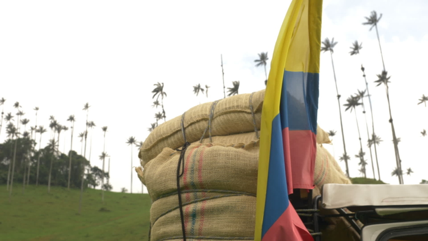 Old car with the colombian flag in the cocora valley Royalty-Free Stock Footage #1092033201