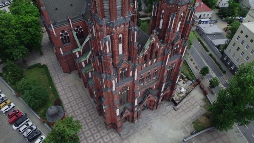 Down to up drone aerial video of the catholic church in Warsaw, Poland, 4k