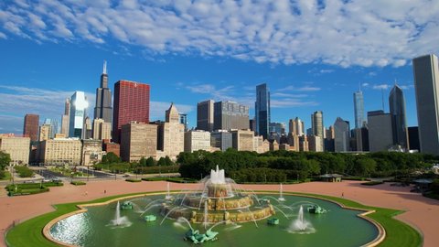 Chicago , IL , United States - 07 03 2022: Chicago Buckingham Fountain Tourist Attraction With City Skyline