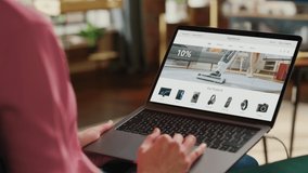 Over Shoulder Person Using Laptop Computer, Online Shopping for Electronics, Wireless Hi-Fi Headphones. e-Commerce Concept of Purchasing, Buying, Ordering Tech Devices on Website. Close-up Shot - Powered by Shutterstock - Get 15% off with code: PIKWIZARD15