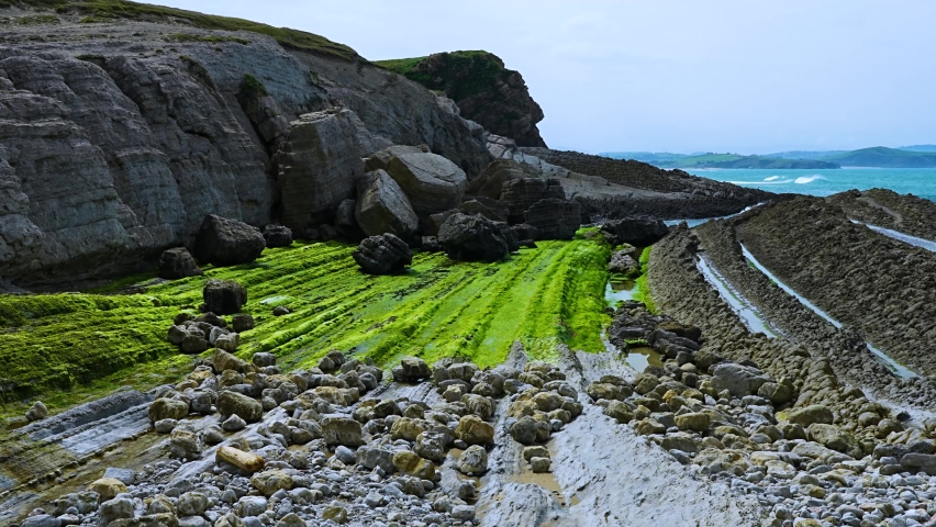 El Madero beach. Flysch and beach in La Arnia. Cliffs of Liencres. Municipality of Piélagos in the Autonomous Community of Cantabria, Spain, Europe